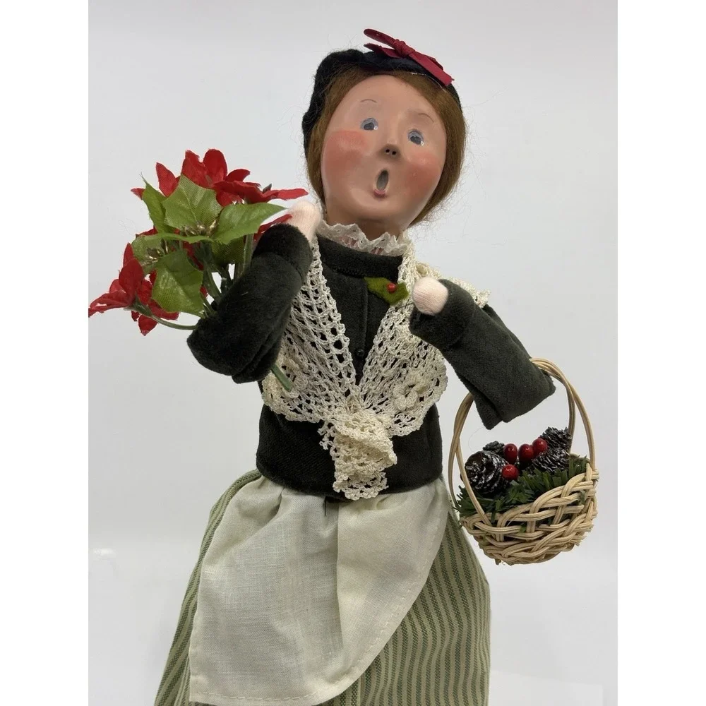 2009 Woman Selling Holiday Flowers By Buyers choice The Carolers